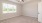 a room with a ceiling fan and a window
