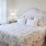 a bed with white sheets