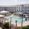 a large building with a pool