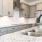 a kitchen with white cabinets