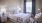 a bedroom with a bed and desk