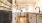 a kitchen with white cabinets