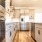 a kitchen with white cabinets