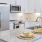 a kitchen with a marble island