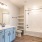 a bathroom with a tub sink and toilet