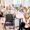 a group of people sitting around a table