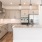 a kitchen with white cabinets
